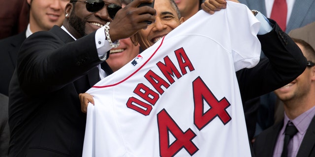 Boston Red Sox player David 'Big Papi' Ortiz takes a selfie with President Barack Obama Tuesday, April 1, 2014.