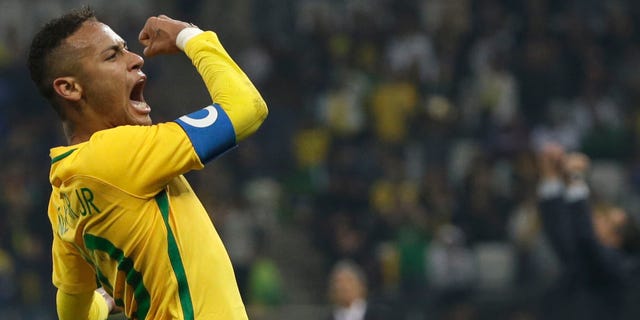 Brazil's Neymar celebrates at the end of a quarter-final match of the men's Olympic football tournament against Colombia in Sao Paulo, Brazil, Saturday Aug. 13, 2016. Brazil won 2-0 and qualified for the semi-finals.(AP Photo/Leo Correa)