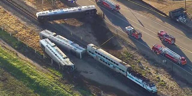 This image from video provided by KABC-TV Los Angeles shows wreckage of a Metrolink commuter train after it crashed into a truck and derailed early on Tuesday, Feb. 24, 2015 in Oxnard, Calif. Three cars of the Southern California Metrolink commuter train derailed and tumbled onto their sides after the collision on tracks in Ventura County, northwest of Los Angeles. (AP Photo/KABC-TV)
