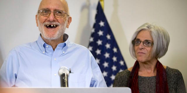 Dec. 17, 2014: Alan Gross, accompanied by his wife, Judy, speaks during a news conference at his lawyer's office in Washington. Gross was released from Cuba after five years in a Cuban prison. (AP Photo/Pablo Martinez Monsivais)