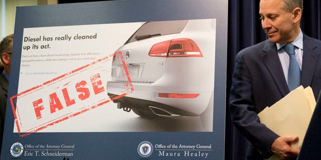 New York Attorney General Eric Schneiderman announces a lawsuit against Volkswagen, Tuesday, July 19, 2016, in New York. (AP Photo/Mark Lennihan)
