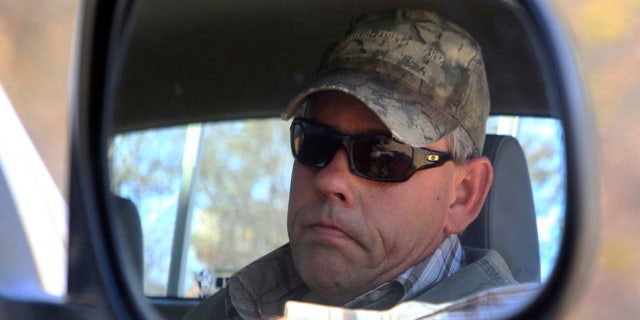 Aug. 5, 2015: Professional hunter Theodore Bronkhorst sits in his car upon his arrival at the magistrates courts to face trial in Hwange about 435 miles south west of Harare, Zimbabwe. (AP Photo/Tsvangirayi Mukwazhi)