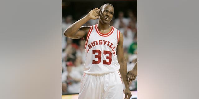 2009 file photo of Andre McGee, who played for Louisville before becoming a staffer. (AP Photo/Ed Reinke)