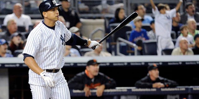 Sept. 20: Alex Rodriguez watches his grand slam during the seventh inning of an interleague baseball game against San Francisco.