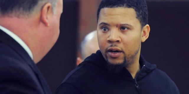 FILE - In this Friday, Oct. 4, 2013, file photo, Alexander Bradley, right, talks with his attorney Robert Pickering, left, during a court appearance at Hartford Superior Court on in Hartford, Conn. Bradley, who alleges he was shot by former New England Patriots tight end Aaron Hernandez, has been shot again in Connecticut. Hartford police Lt. Brian Foley says Bradley was shot several times in the leg Sunday night, Feb. 2, 2014, at the Vevo Lounge Bar & Grill, and was taken to a hospital. His condition hasn't been released. (AP Photo/The Hartford Courant, Richard Messina, Pool, File)