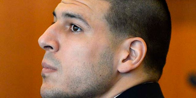 July 22, 2014: In this file photo, former New England Patriots' Aaron Hernandez watches during a hearing in Bristol County Superior Court in Fall River, Mass. (AP)