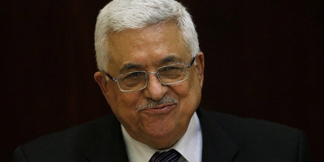 May 11: Palestinian President Mahmoud Abbas smiles during a Palestinian Liberation Organization executive committee meeting in the West Bank city of Ramallah.