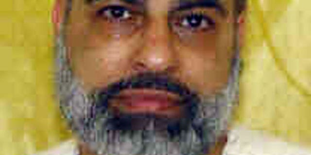 This undated file photo provided by the Ohio Department of Rehabilitation and Correction shows Abdul Awkal, convicted in the 1992 slayings of his estranged wife and brother-in-law at a courthouse in Cleveland's Cuyahoga County.