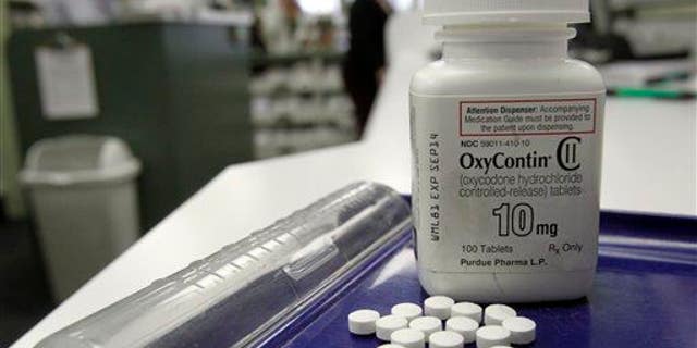 OxyContin pills appear in a photo at a pharmacy in Montpelier, Vt., on Feb. 19, 2013.