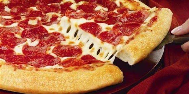 Several Pizza Hut employees got caught celebrating the New Year while still on duty.