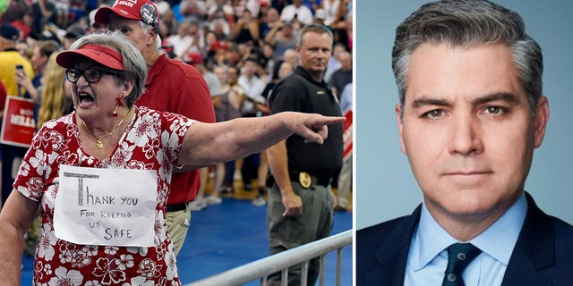 Maria Rojas, from West Columbia berates CNN Chief White House Correspondent Jim Acosta, right, before President Trump who is in town to support Gov. Henry McMaster speaks to the crowd at Airport High School Monday, June 25, 2018, in West Columbia, S.C.