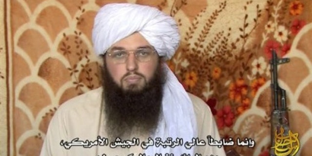 This image from video released by IntelCenter Sunday, March 7, 2010, shows Adam Gadahn, featured in a video posted Sunday, coincidentally the day that his arrest by Pakistani intelligence officers in the southern city of Karachi was announced. In the video the 31-year-old American al-Qaida spokesman called for Muslim violence, praising the U.S. Army major charged with killing 13 people in Fort Hood, Texas, as a role model for other Muslims.