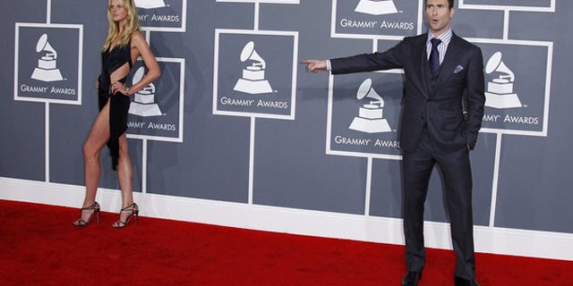 Feb. 12, 2012: Adam Levine of Maroon 5 and his girlfriend Anne Vyalitsyna arrive at the 54th annual Grammy Awards in Los Angeles, California.
