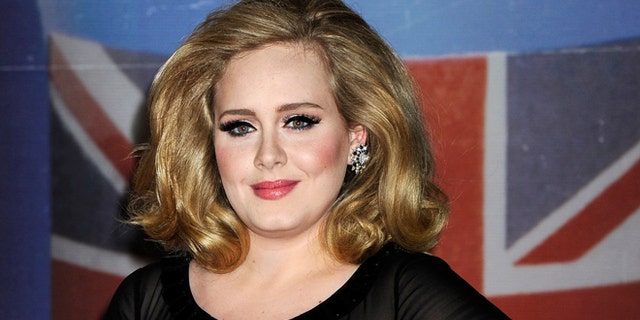 Feb. 21, 2012: In this file photo, performer Adele arrives for the Brit Awards 2012 at the O2 Arena in London.