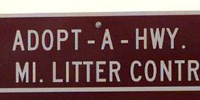 An ADOPT-A-HWY sign in Missouri.