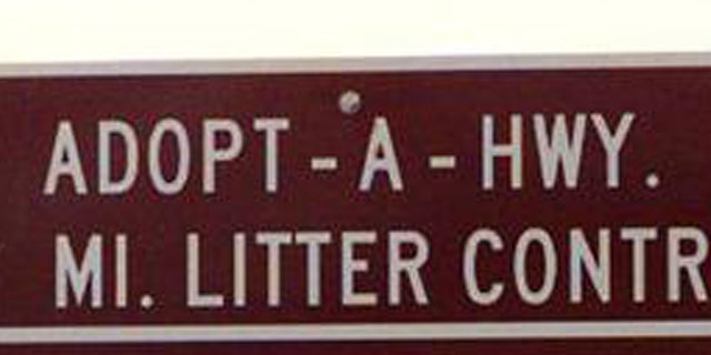 An ADOPT-A-HWY sign in Missouri.