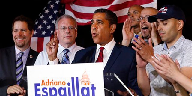 Espaillat declaring his race with Rangel too close to call in the Democratic primary for NY's 13th Congressional District, June 24, 2014.