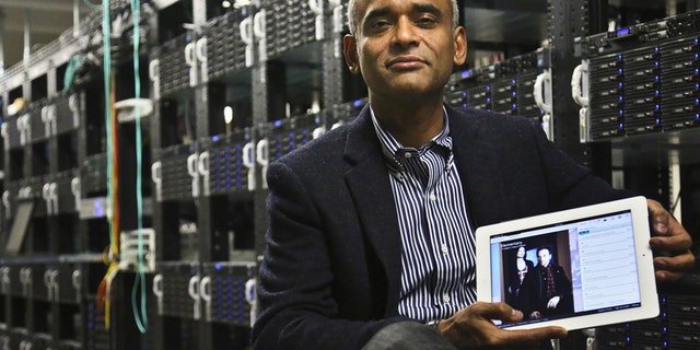 This Dec. 20, 2012 file photo shows Chet Kanojia, founder and CEO of Aereo, Inc., holding a tablet displaying his company's technology.