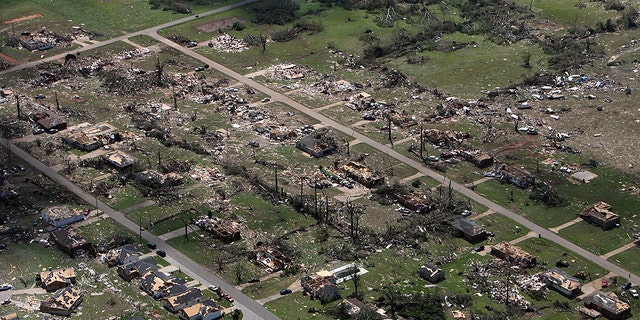 April 28: This aerial photo shows the devastation of  homes in Cottondale, Ala. sustained heavy damage.