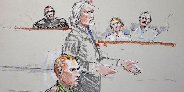 Oct. 31: U.S. Army Staff Sgt. Calvin Gibbs, seated at lower left, is shown in this courtroom sketch as his attorney Phil Stackhouse stands at center.
