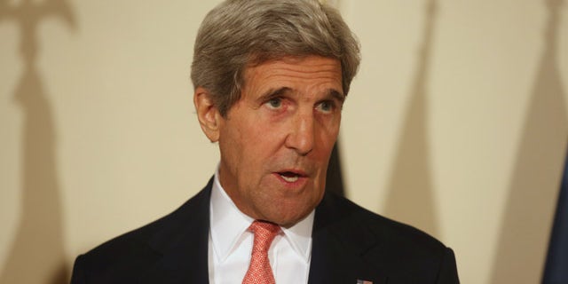 July 12, 2014: U.S. Secretary of State John Kerry speaks during a joint press conference in Kabul, Afghanistan (AP Photo/Rahmat Gul)