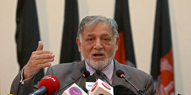 July 7, 2014 - Ahmad Yousuf Nouristani, chairman of the Independent Election Commission, speaks in Kabul, Afghanistan. Aghanistan's election commission says that former finance minister Ashraf Ghani Ahmadzai has the lead in preliminary results from a disputed presidential runoff vote.