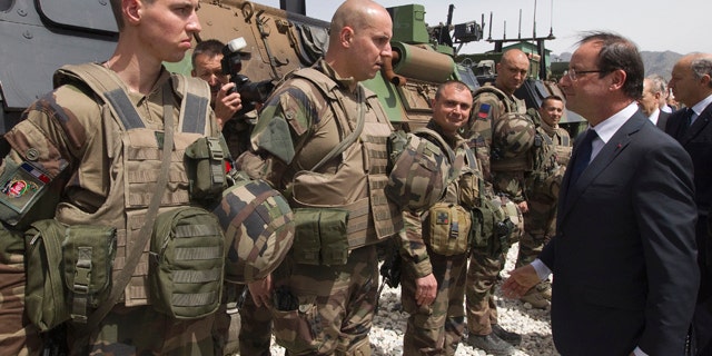 May 25, 2012: French President Francois Hollande review troops at Forward Operating Base (FOB) in Nijrab, Kapisa region, Afghanistan, where most of French troops are stationed in Afghanistan.