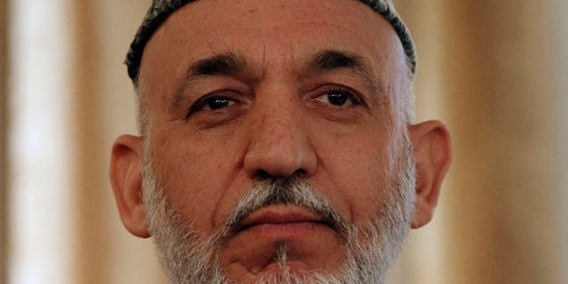 Afghan President Hamid Karzai (pictured) met with Gen. David Petraeus in Kabul for the first time since Karzai called for a drawdown of NATO military activities.