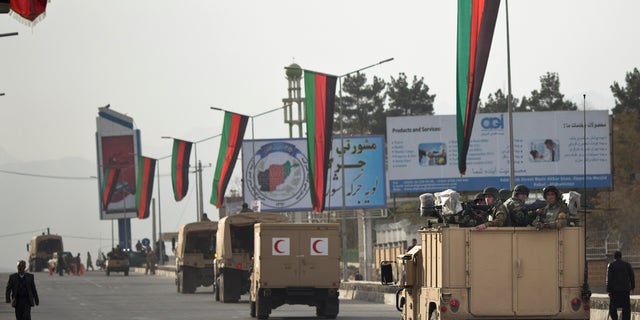 Nov. 18, 2013 - A convoy of Afghan soldiers moves into the area where the Loya Jirga will take place later this week in Kabul, Afghanistan. Security stepped up after a blast on Nov. 16. Thousands of prominent Afghans are scheduled to meet in the Afghan capital to debate a contentious security agreement with the US.
