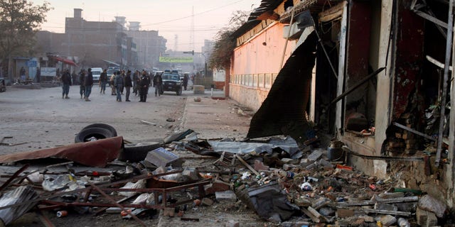 Jan. 10, 2012: Debris are seen at the scene of explosions in Jalalabad, Nangarhar province east of Kabul, Afghanistan.