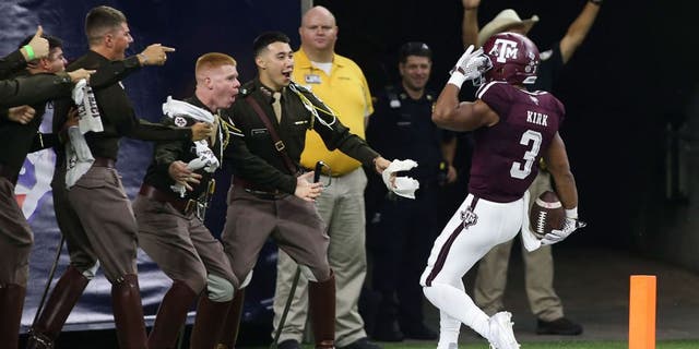Sep 5, 2015; Houston, TX, USA; Texas A&M Aggies wide receiver Christian Kirk (3) salutes after returning a punt for a touchdown during the second quarter against the Arizona State Sun Devils at NRG Stadium. Mandatory Credit: Troy Taormina-USA TODAY Sports