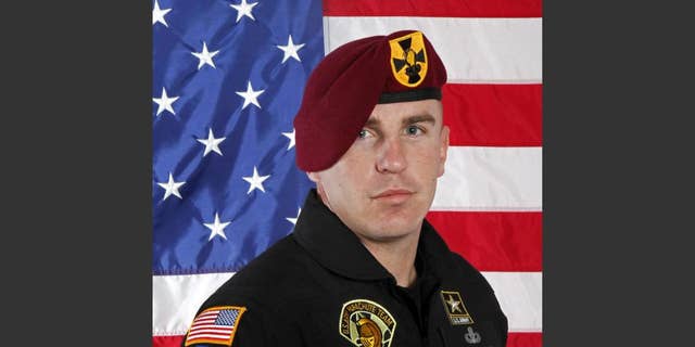 This undated photo provided by the U.S. Army shows Sgt. 1st Class Corey Hood. A parachutist the Army Golden Knights, Hood died Sunday after suffering severe injuries from an accident during a stunt on Saturday at the Chicago Air &amp; Water Show, the Cook County medical examiner's office said. (U.S Army via AP)