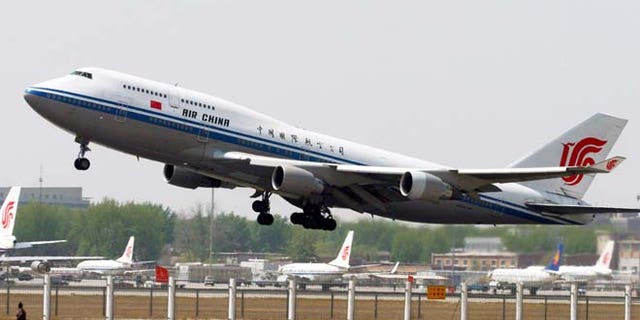 FILE 2006: An Air China Boeing 747 aircraft takes off from Beijing's international airport.