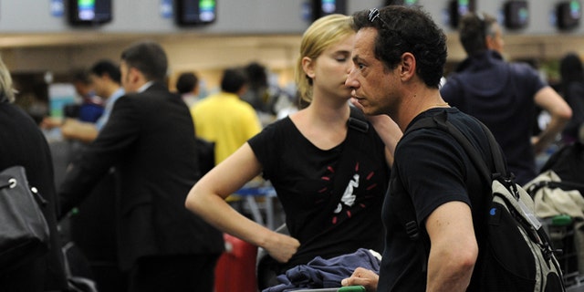 Passengers in the departure terminal of the Tom Jobim International airport in Rio de Janeiro.