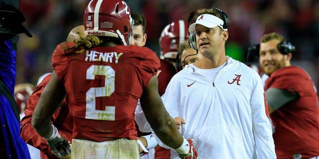Nov 7, 2015; Tuscaloosa, AL, USA; Alabama Crimson Tide running back Derrick Henry (2) celebrates a touchdown with offensive coordinator Lane Kiffin during the third quarter against the LSU Tigers at Bryant-Denny Stadium. Mandatory Credit: Marvin Gentry-USA TODAY Sports