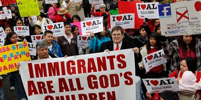 Opponents of Alabama's immigration law gather for a rally outside the Statehouse in Montgomery, Alabama.