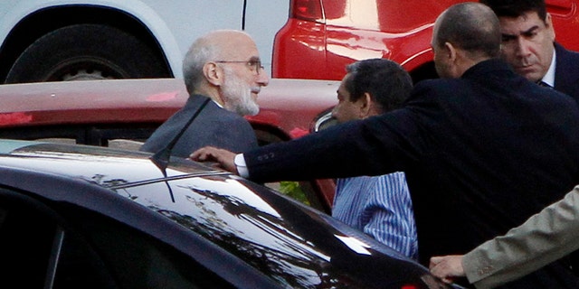 Alan Gross outside the courthouse in Havana, Cuba, in a March 5, 2011, file photo.