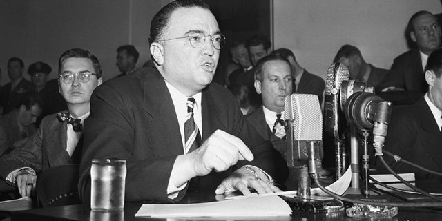 This March 26, 1947, file photo shows Federal Bureau of Investigation Director J. Edgar Hoover calling the communist party of the United States a