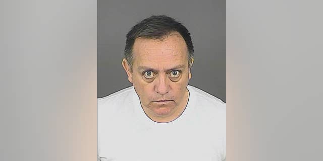 This Wednesday, Aug. 26, 2015 booking photo provided by the Denver District Attorney’s Office shows Jason Martinez who was booked Wednesday on a no-bond hold. Martinez a former Albuquerque, New Mexico, school administrator who faces child sex abuse charges in Colorado has been booked into a Denver jail a day after a judge issued a warrant for his arrest. (Denver District Attorney’s Office via AP)