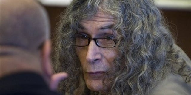 Rodney Alcala talks with his investigator before being convicted in Santa Ana, Calif. on Feb. 25, 2010, of murdering a 12-year-old girl and four women in the late 1970s (AP).