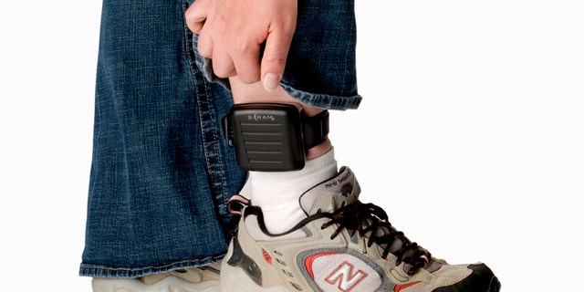 This product image provided by AMS, shows the SCRAMx alcohol-monitoring ankle bracelet.