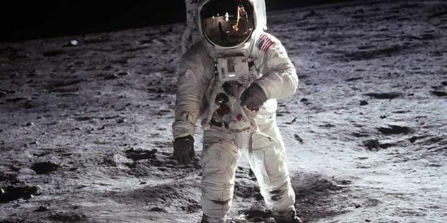 Buzz Aldrin, Apollo 11, 1969: Astronaut Buzz Aldrin, lunar module pilot, walks on the surface of the Moon near the leg of the Lunar Module "Eagle" during the Apollo 11 extravehicular activity.