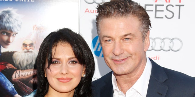 FILE - This Nov. 4, 2012 file photo shows actor Alec Baldwin, right, and his wife Hilaria Thomas at the "Rise Of The Guardians'" special screening during the 2012 AFI FEST at Grauman's Chinese Theatre in the Hollywood section of Los Angeles. A possible plea deal in New York for Genevieve Sabourin, a Canadian actress accused of stalking Alec Baldwin has been postponed. Police originally arrested Sabourin after authorities said she had implored Baldwin to see and to marry her in emails sent only days after he became engaged to yoga instructor Hilaria Thomas. She later spent a night in jail after she was accused of sending Thomas a Twitter message. (Photo by Todd Williamson/Invision/AP, file)