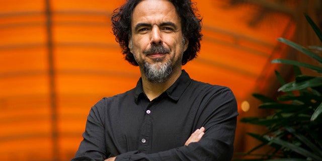FILE - In this Wed., Dec. 17, 2014 file photo, Alejandro Gonzalez Inarritu, director of the film "Birdman," poses for a portrait at the Four Seasons Hotel in Los Angeles. Birdman is looking to drop another trophy into its nest ahead of the Academy Awards. After taking top honors from the acting and producing guilds, the film featuring Michael Keaton as a former superhero film star faces one last flight at the Directors Guild Awards on Saturday, Feb. 7, 2015, in Los Angeles. (Photo by Chris Pizzello/Invision/AP, File)