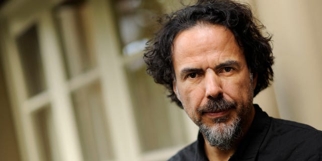In this Wed., Dec. 17, 2014 photo, Alejandro Gonzalez Inarritu, director of the film "Birdman," poses for a portrait at the Four Seasons Hotel in Los Angeles. Inarritu says there was only one way to tell the story of a celebrityâs struggle with ego in âBirdman,â and that was with long, uninterrupted takes that move at the speed of life. (Photo by Chris Pizzello/Invision/AP)
