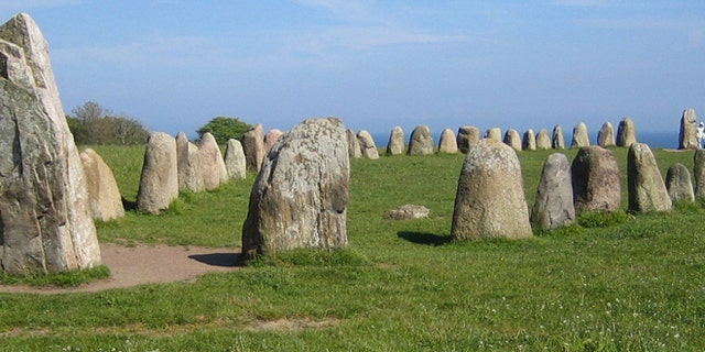Ale's Stones, a megalithic monument in southern Sweden, resembles a stone ship built of 59 large sandstone boulders, weighing up to 1.8 tons each.