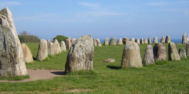 Ale's Stones, a megalithic monument in southern Sweden, resembles a stone ship built of 59 large sandstone boulders, weighing up to 1.8 tons each.