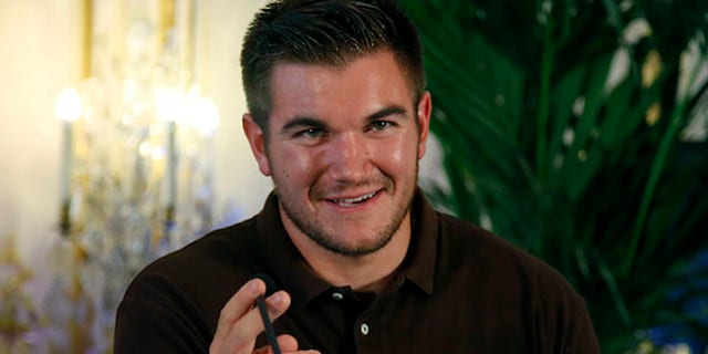 Alek Skarlatos attends a press conference held at the U.S. Ambassador's residence in Paris, France, Sunday, Aug. 23, 2015. (AP Photo/Francois Mori)