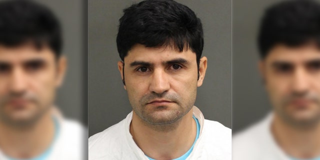 Ali Borji was charged with stalking a student in Florida.