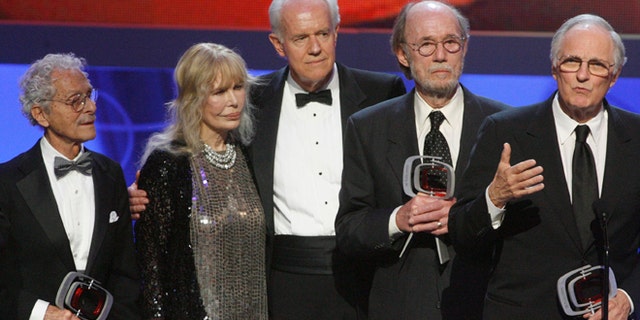 Cast members of "M*A*S*H*" (L-R) Allan Arbus, Loretta Swit, Mike Farrell, Burt Metcalfe and Alan Alda accept the Impact award at the taping of the seventh annual TV Land Awards in Los Angeles, California April 19, 2009.